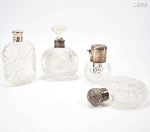 GROUP OF SILVER TOPPED DRESSING TABLE BOTTLES