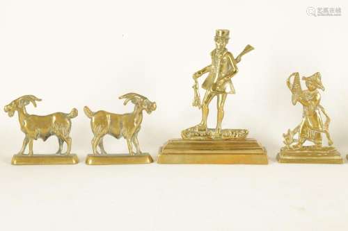 A GROUP OF FOUR 19TH CENTURY LARGE FIGURAL CAST BRASS HEARTH...