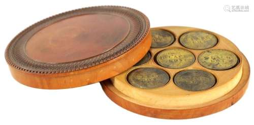 AN UNUSUAL 19TH CENTURY SYCAMORE TREEN COIN HOLDER CONTAININ...