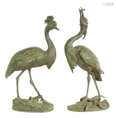 A PAIR OF 19TH CENTURY PATINATED BRONZE HERONS