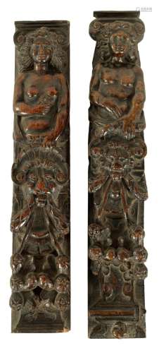 A PAIR OF EARLY CARVED OAK PILASTERS
