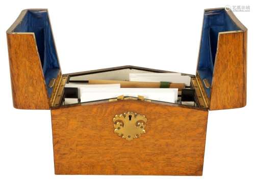 A LATE 19TH CENTURY OAK WRITING BOX, RETAILED BY DIMMOCK NOR...