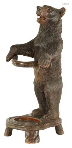 A LATE 19TH CENTURY CARVED BLACK FOREST BEAR STICK STAND