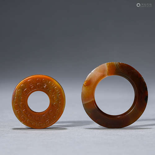 Two Carved Jade Pendants