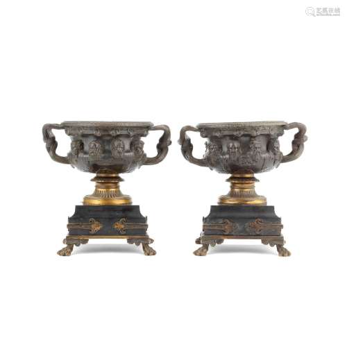 A pair of late 19th century patinated bronze garniture urns ...
