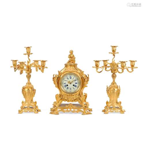 【TP】A late 19th century French gilt bronze clock garniture  ...