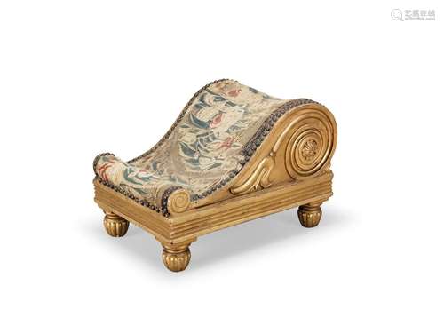 A late Regency giltwood footstool in the manner of Matthew G...