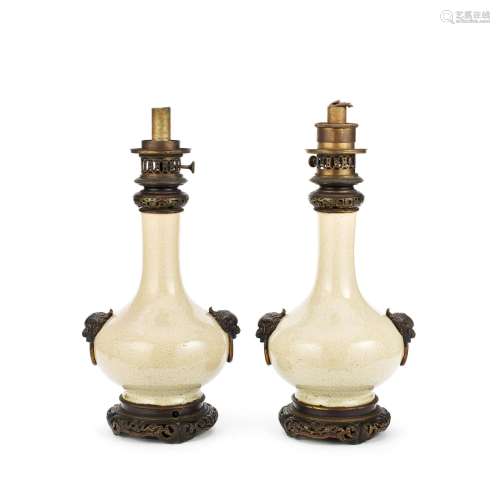 A pair of Chinese porcelain Ge-type bottle vases  mounted as...