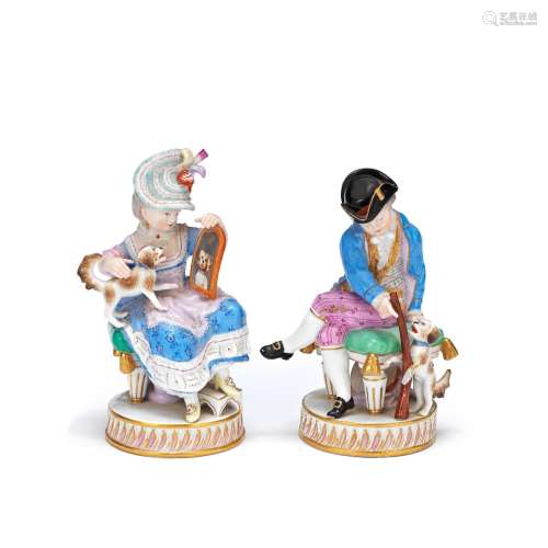 A pair of late 19th century Meissen porcelain figures of a y...