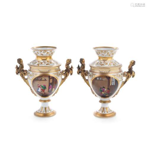 A pair of 19th century Paris style Fench porcelain garniture...