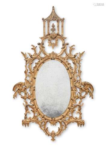 【TP】A late 19th/early 20th century carved giltwood mirror in...