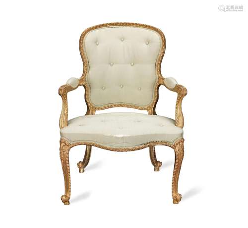 【TP】A George III carved giltwood open armchair in the French...