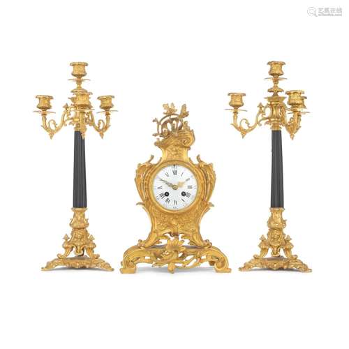 【TP】A matched late 19th century French gilt bronze clock gar...