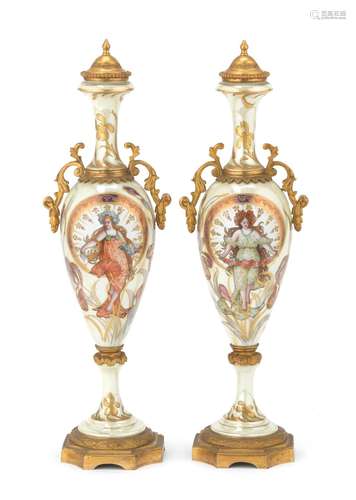 A pair of early 20th century French gilt bronze mounted Sevr...