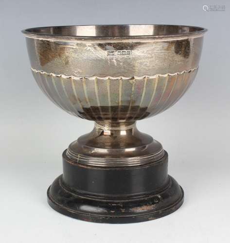 A George V silver half-reeded circular rose bowl on a circul...