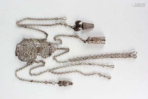 A late Victorian silver châtelaine, the clip cast and pierce...