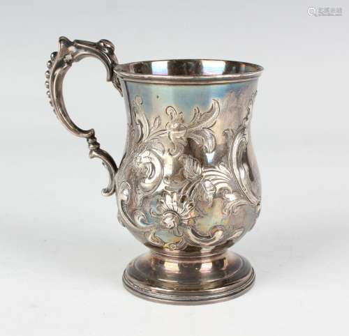 A Victorian silver christening mug of baluster form, embosse...