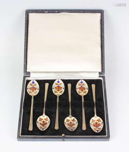 A set of six Elizabeth II silver gilt and cloisonné enamelle...
