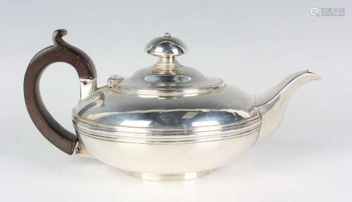 A George IV silver squat circular bachelor's teapot with ree...