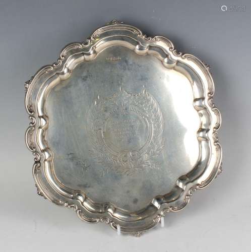 An Edwardian silver circular salver, presentation inscribed ...