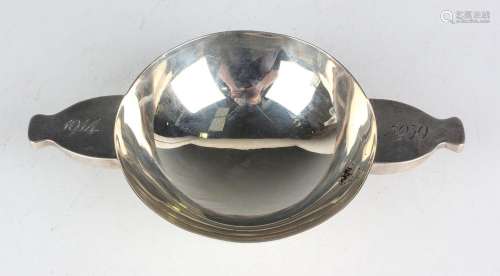 A George VI silver quaich, the circular bowl flanked by two ...