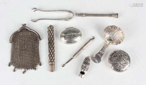 A George V silver caddy spoon with scallop shell bowl and br...