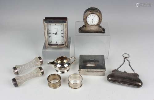 An Edwardian silver mounted bedside timepiece with circular ...