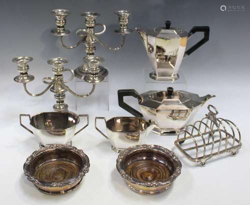 A collection of plated items, including a pair of twin scrol...