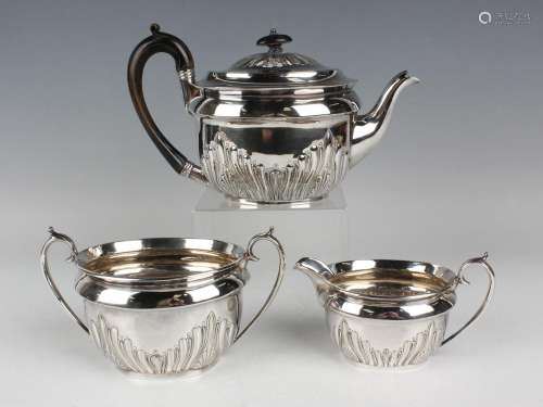 A late Victorian plated oval three-piece tea set with wavy r...
