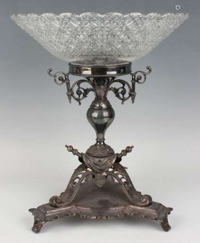 A late Victorian plated and cut glass table centrepiece, the...