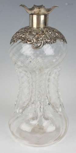 An Edwardian silver mounted clear glass cluck-cluck decanter...