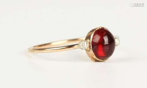 A gold, garnet and rose cut diamond ring, collet set with th...