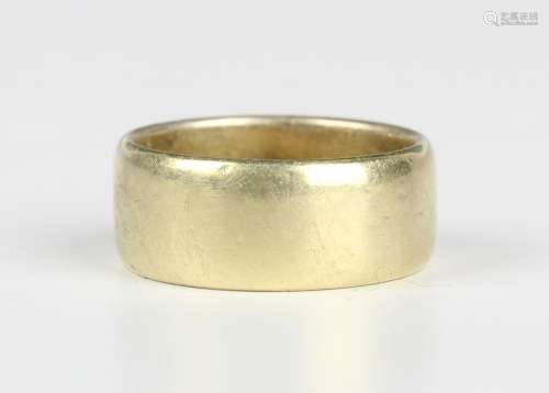 An 18ct gold wide band wedding ring, London 1972, weight 8.9...
