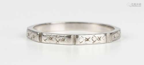 A platinum decorated wedding ring, detailed 'Platinum', weig...