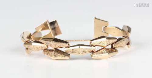 A 9ct gold bracelet in a tapered lozenge shaped link design ...