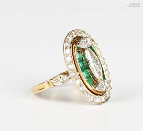 A French gold, emerald and diamond oval ring in an Art Deco ...