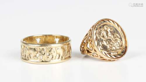 A 9ct gold ring, pierced with a row of elephants, Birmingham...