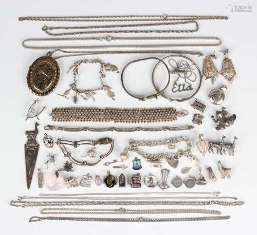 A group of mostly silver jewellery, comprising two charm bra...