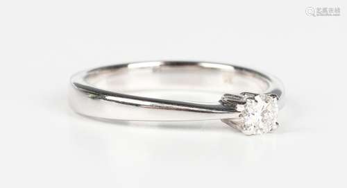 A 9ct white gold and diamond single stone ring, claw set wit...