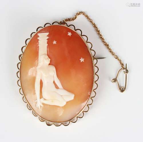 A 9ct gold mounted oval shell cameo brooch, carved as a maid...