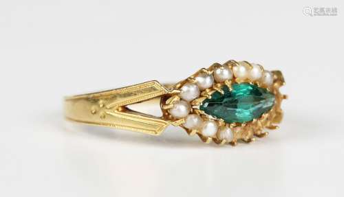 An Edwardian 18ct gold, seed pearl and marquise shaped green...