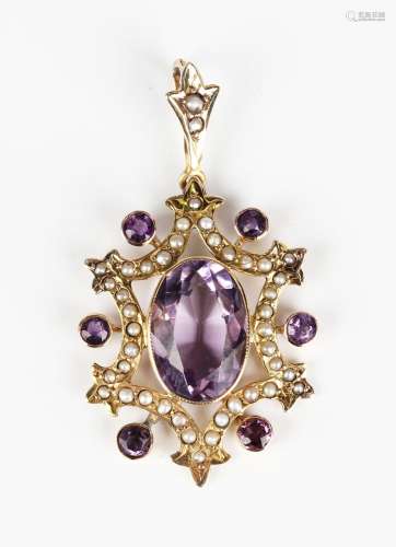 A gold, amethyst and seed pearl pendant, circa 1910, collet ...