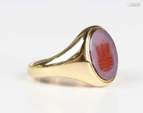 A late Victorian 18ct gold and oval sardonyx signet ring, th...