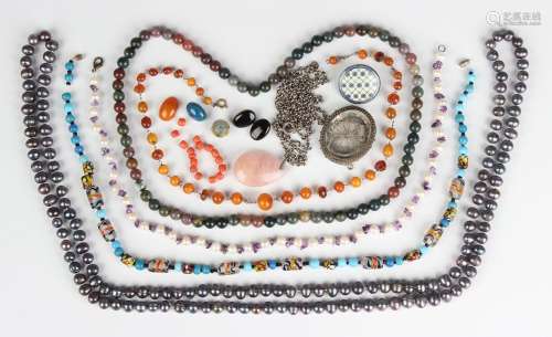 A group of jewellery, including an amber bead necklace, set ...