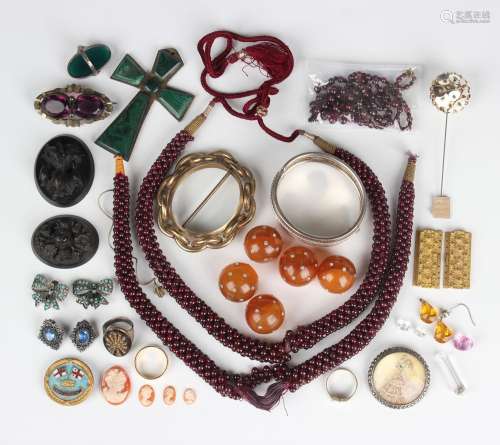 A small group of jewellery, including two multiple strand ga...