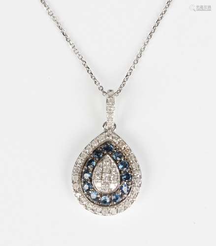 A white gold, sapphire and diamond cluster drop shaped penda...