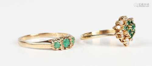 An 18ct gold, emerald and diamond pear shaped cluster ring, ...