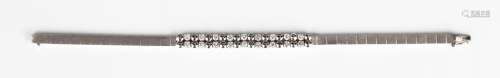 A white gold and diamond bracelet, the front claw set with n...