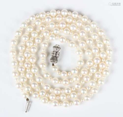 A long single row necklace of cultured pearls, designed as a...