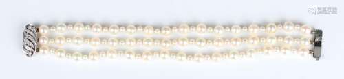 A three row bracelet of cultured pearls, each row designed a...